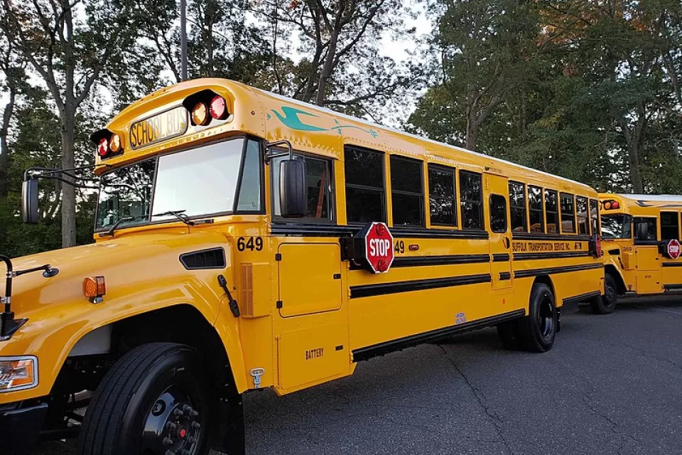 Yellow electric Blue Bird school bus